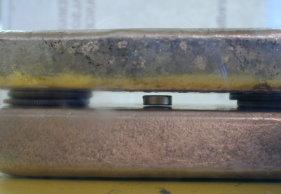 Closeup of levitating magnet